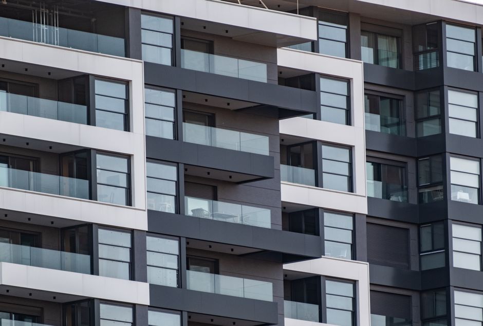 Contemporary apartment facade with glass balconies in Bornova, İzmir, Türkiye.